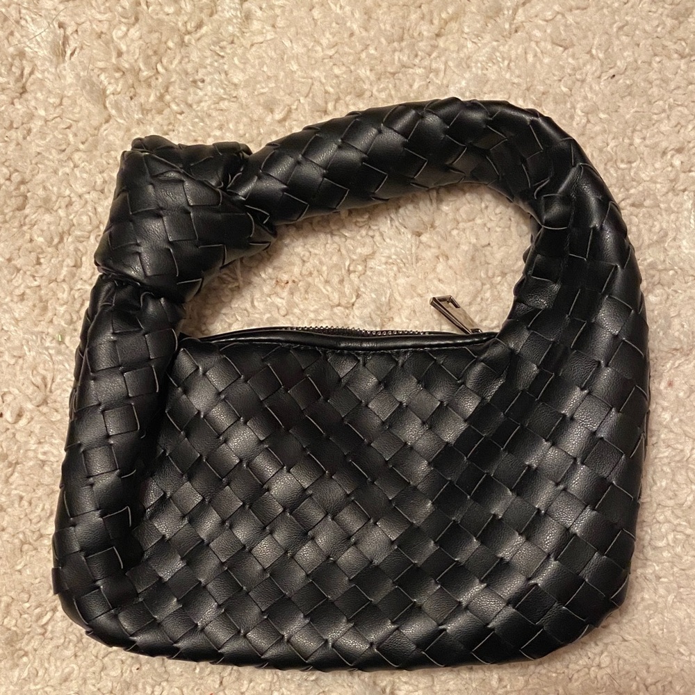 small black knotted woven faux leather bag